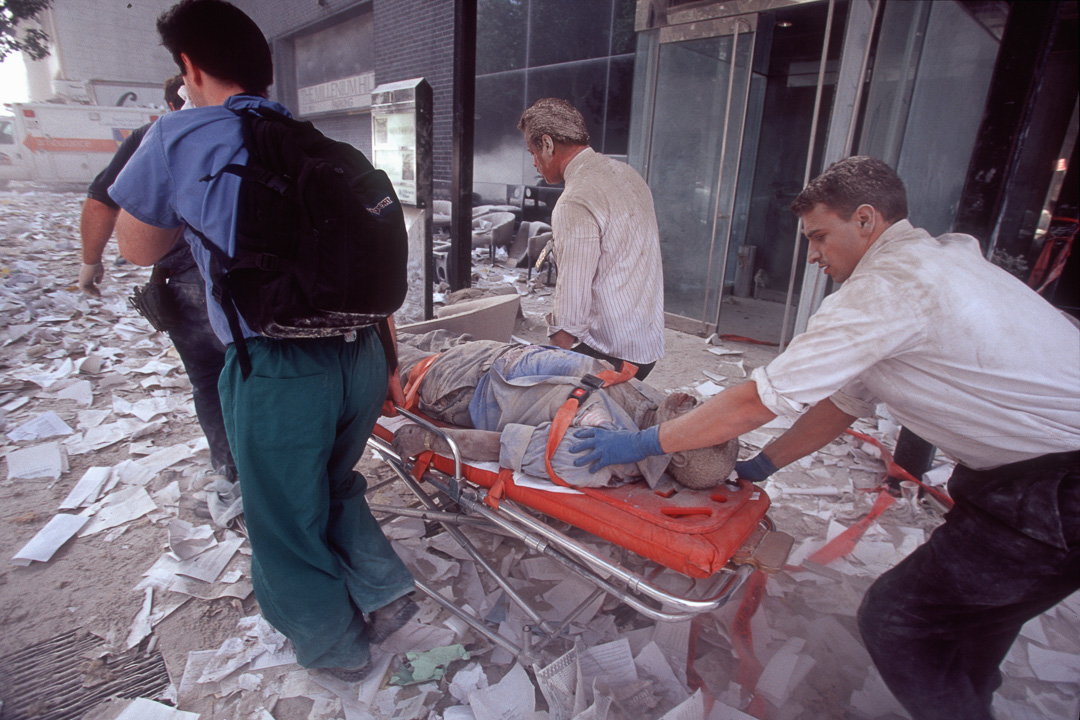 EMTs and volunteers bring a man out of WTC rubble