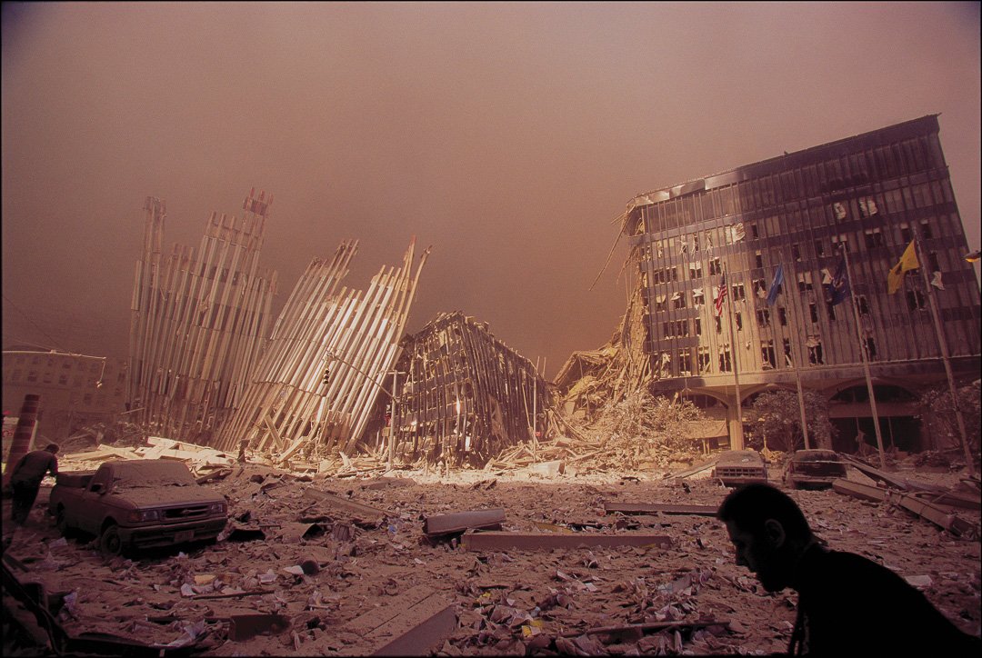 Survivors of the 1st tower collapse gasp for air