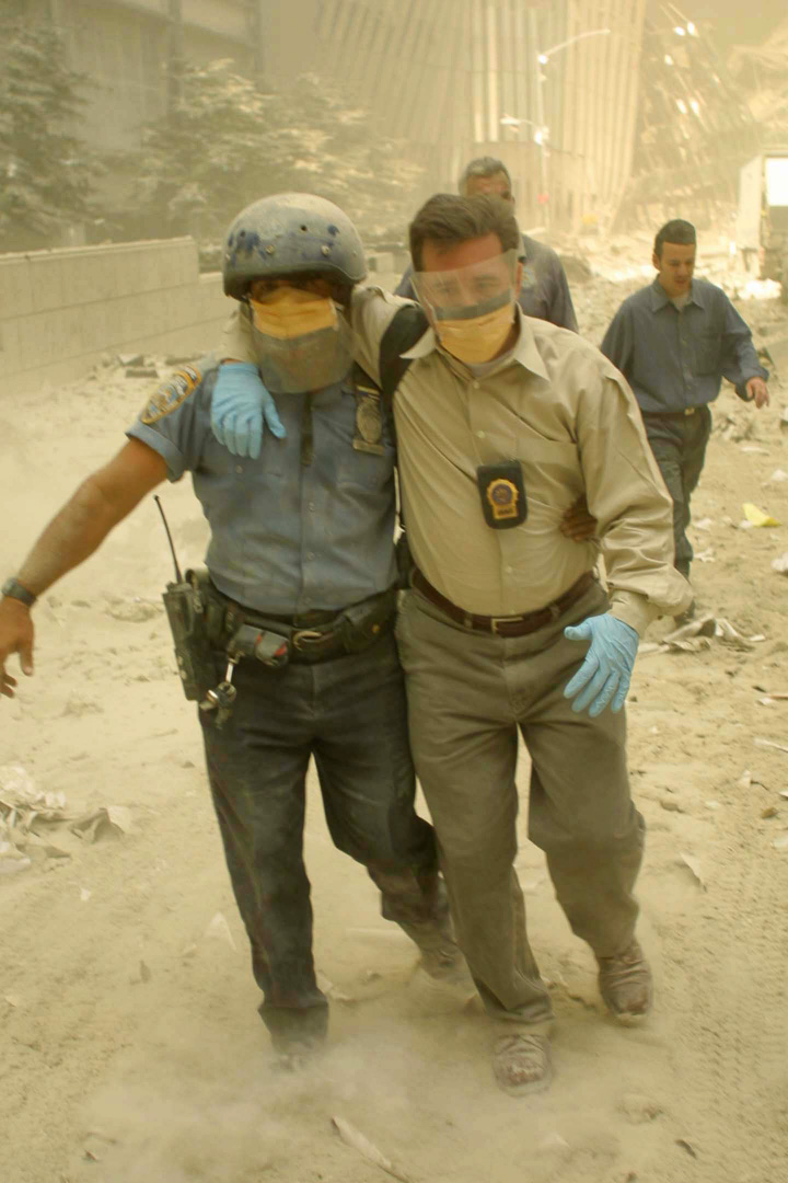 NYPD officer assists NYPD Detective after 1st tower collapse