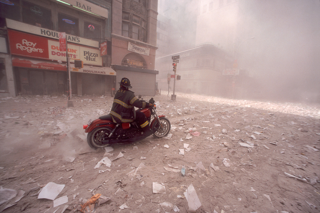 Firefighter Tim Duffy arrives downtown after 1st tower collapse