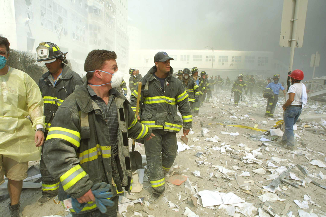 Firemen leaving WTC after 2nd tower collapse