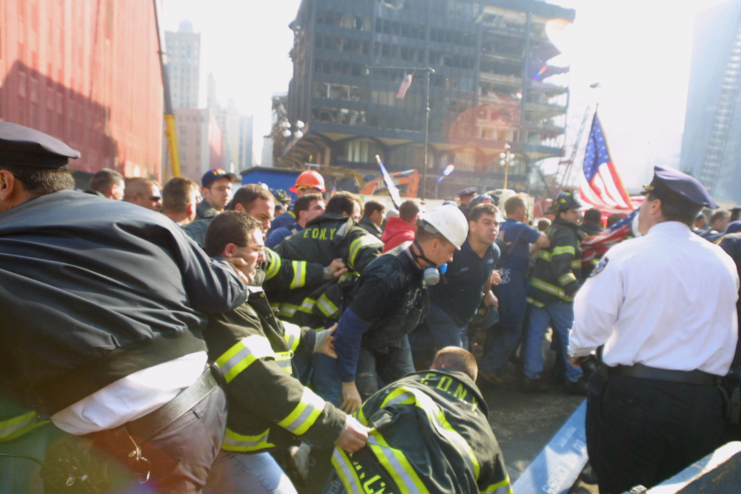 Firefighters rally and demonstrate over cutbacks in force at Ground Zero