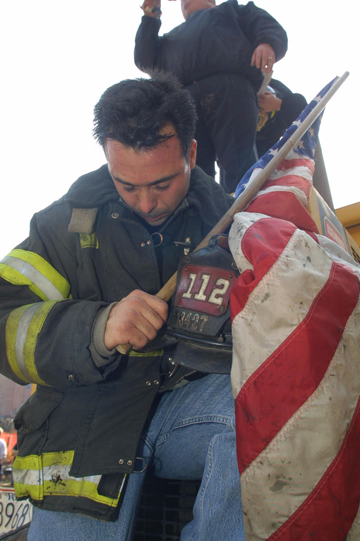 Firefighters rally and demonstrate over cutbacks in force at Ground Zero