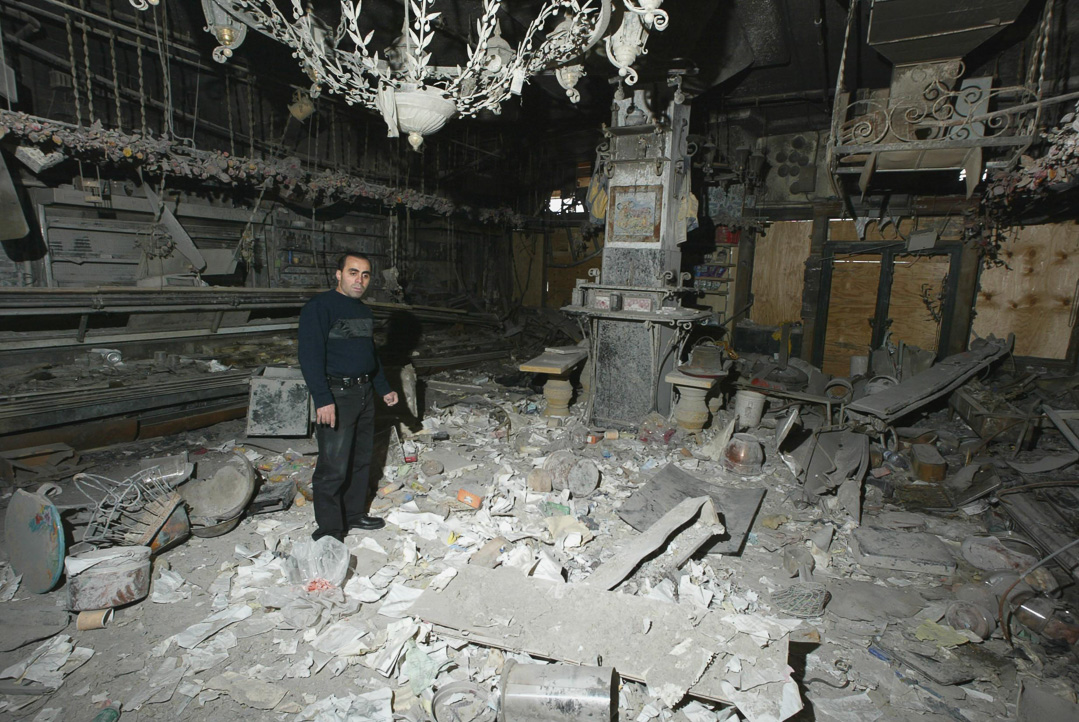 Adam Arici in the remains of his Amish Market Deli Restaurant