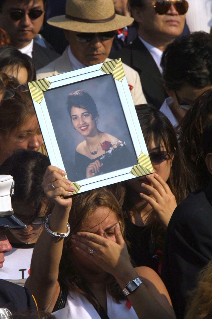 Families of the 9/11 victims at Ground Zero 1 year later