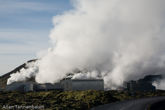 Steam rises form both a geothermal power plant and the Blue Lagoon hot springs, world renowned as a bathing spa.///