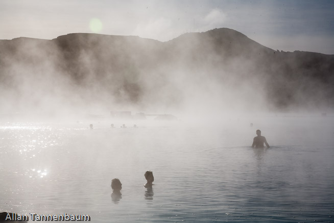 Steam rises form both a geothermal power plant and the Blue Lagoon hot springs, world renowned as a bathing spa.///