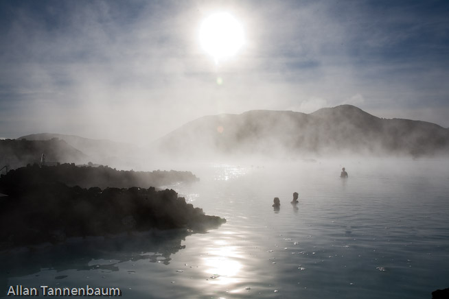 Steam rises form both a geothermal power plant and the Blue Lagoon hot springs, world renowned as a bathing spa.///