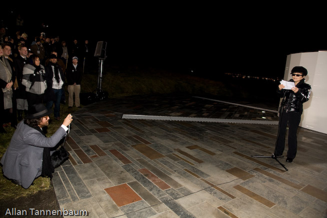 Yoko Ono, along with Ringo Starr and Olivia Harrison, dedicates the Imagine Peace Tower on Videy Island. A reception at the Art Museum of Reykjavik followed.///