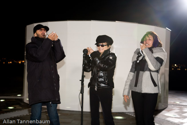 Yoko Ono, along with Ringo Starr and Olivia Harrison, dedicates the Imagine Peace Tower on Videy Island. A reception at the Art Museum of Reykjavik followed.///