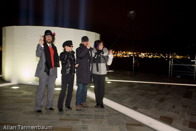 Yoko Ono, along with Ringo Starr and Olivia Harrison, dedicates the Imagine Peace Tower on Videy Island. A reception at the Art Museum of Reykjavik followed.///