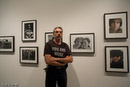 Allan Tannenbaum wears a John Lennon t-shirt from Worn Free at his exhibition of John Lennon and Yoko Ono photographs at the STeven Kasher Gallery.