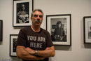 Allan Tannenbaum wears a John Lennon t-shirt from Worn Free at his exhibition of John Lennon and Yoko Ono photographs at the STeven Kasher Gallery.